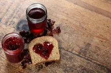 Sour cherry jam on a slice of bread
